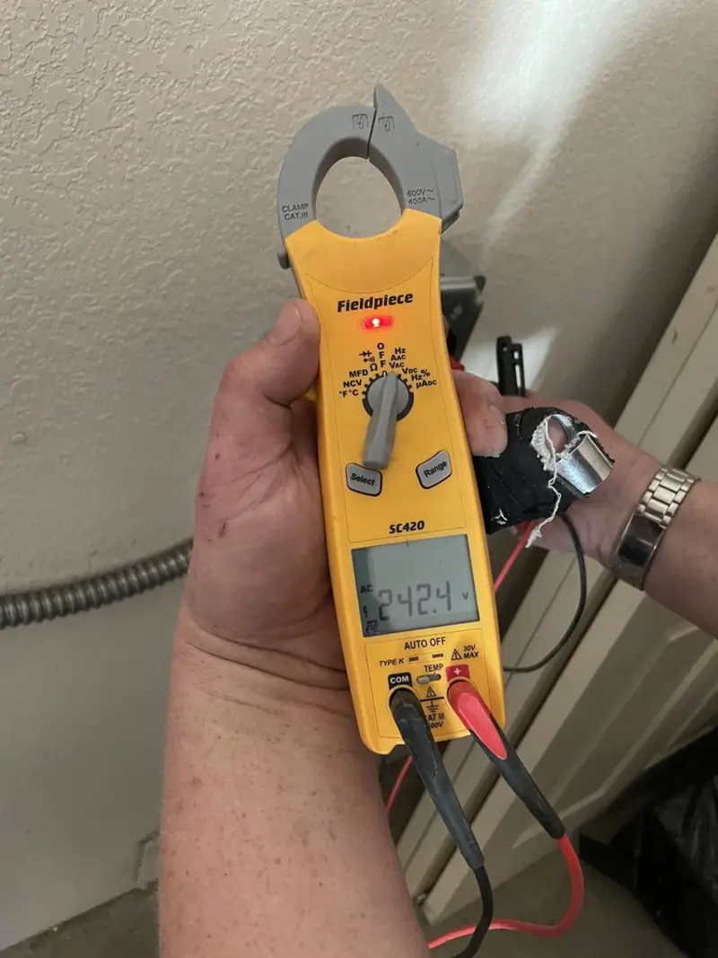 Voltage testing with clamp meter during Outlet Installation in Yarmouth